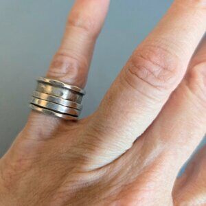 Sterling silver ring with moving details.